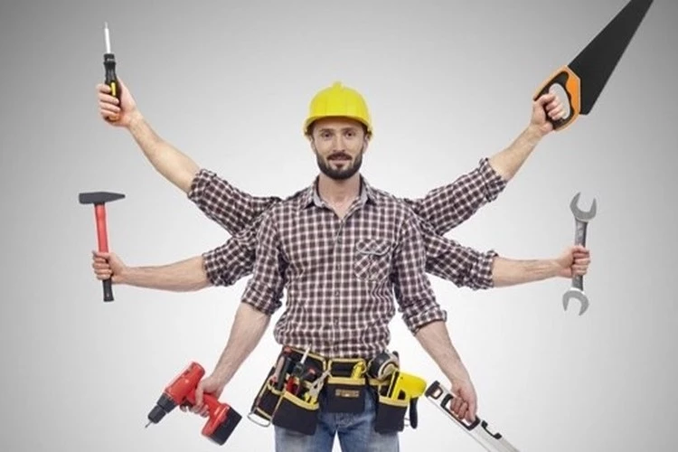 Picture of a male Handyman Contractor showing off his tool collection