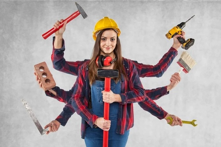 Picture of a femail Handyman Contractor shwoing off her tool collection